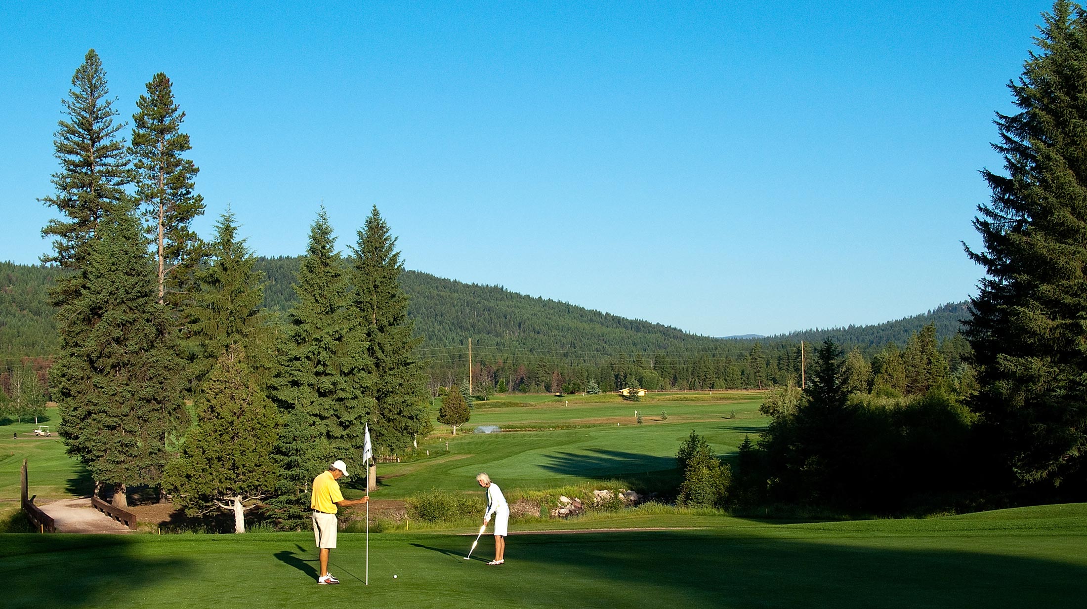 Take in the fall scenic views in Western Montana by playing a round of golf while admiring the Tamarack trees and snowcapped peaks.