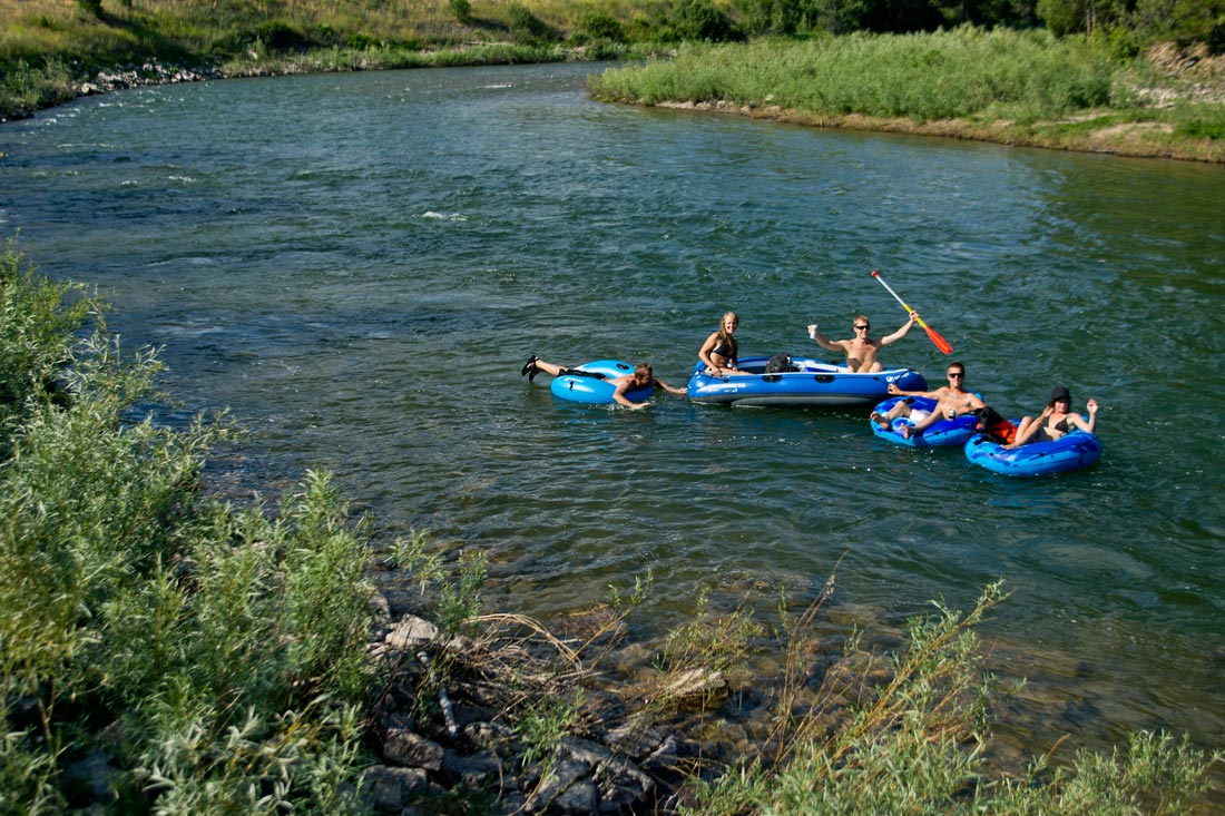Visitors floating on the river in Fall in Montana.